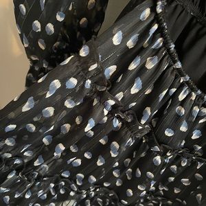 Open back dress w/ silver accents + ruffle skirt